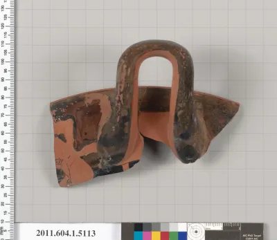 Terracotta rim fragment of a kylix (drinking cup)