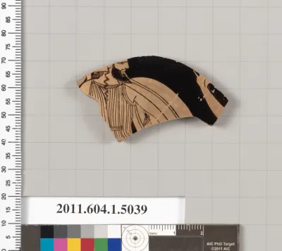 Terracotta fragment of a kylix (drinking cup)