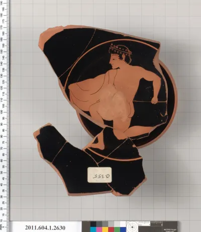 Terracotta fragment of a kylix (drinking cup)