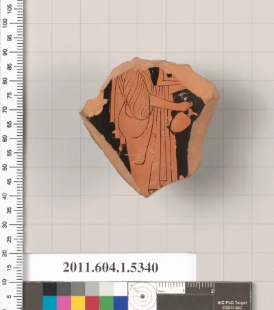 Terracotta fragment of a kylix (drinking cup)
