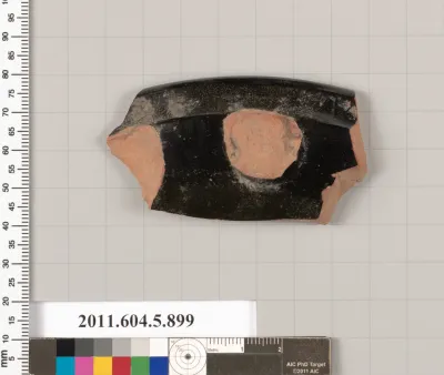 Terracotta rim fragment of a kylix (drinking cup)