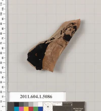 Terracotta fragment of a kylix (drinking cup)