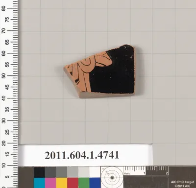 Terracotta fragment of a kylix (drinking cup)