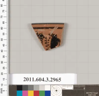 Terracotta rim fragment of a kylix (drinking cup)