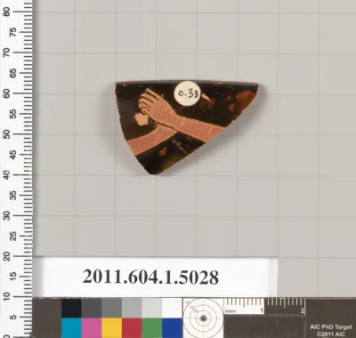 Terracotta fragment of a kylix (drinking cup)