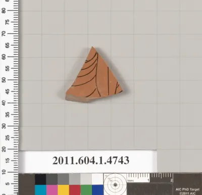 Terracotta fragment of a kylix (drinking cup)