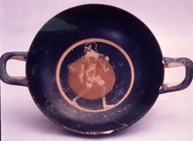 CUP, STEMLESS (ATHENIAN, BLACK-FIGURE)