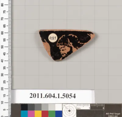 Terracotta fragment of a kylix (drinking cup)