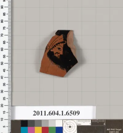 Terracotta rim fragment of a kylix (drinking cup)