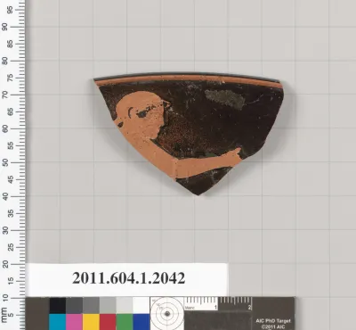 Terracotta rim fragment of a kylix (drinking cup)