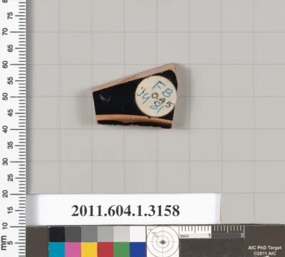 Terracotta fragment of a kylix (drinking cup)