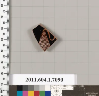 Terracotta fragment of a kylix (drinking cup)