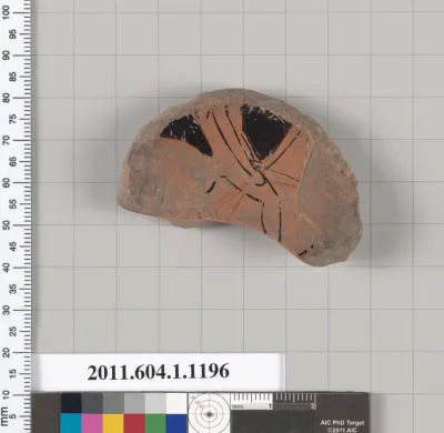 Terracotta fragment of a kylix (drinking cup)