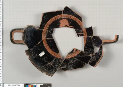 Terracotta fragment of a kylix (drinking cup)