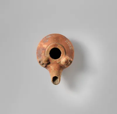 Terracotta oil lamp