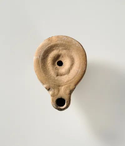 Terracotta oil lamp