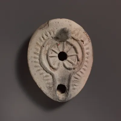 Terracotta oil lamp