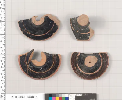 Terracotta fragments of kylikes (drinking cups)