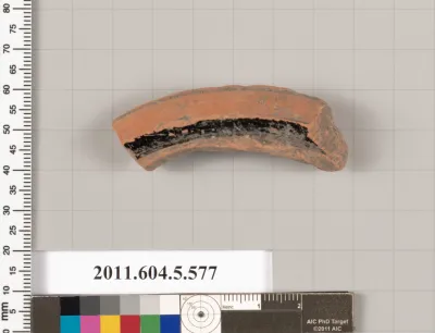 Terracotta fragment of a stemless kylix (drinking cup)?