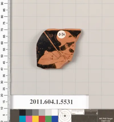 Terracotta rim fragment of a kylix (drinking cup)