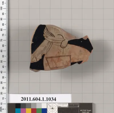 Terracotta fragment of a kylix (drinking cup)