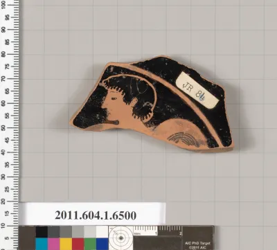 Terracotta fragment of a kylix (drinking cup)