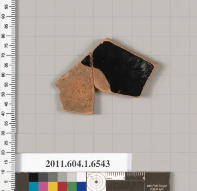 Terracotta fragment of a kylix (drinking cup)