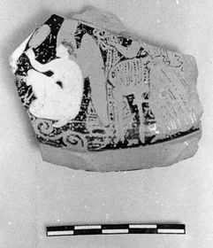 PYXIS LID, FRAGMENT (ATHENIAN, RED-FIGURE)