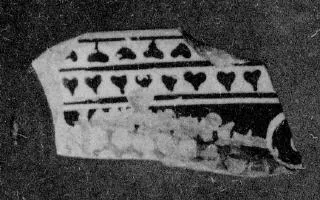 FIGURE VASE, FRAGMENT (ATHENIAN, RED-FIGURE)