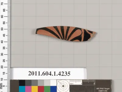 Terracotta fragment of a kylix (drinking cup)