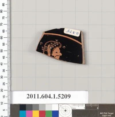 Terracotta fragment of a kylix (drinking cup)