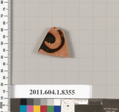 Terracotta fragment of a kylix (drinking cup)