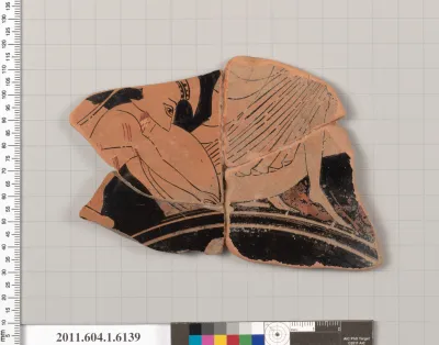Terracotta fragment of a kylix (drinking cup)