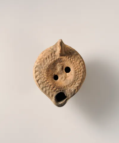Terracotta oil lamp