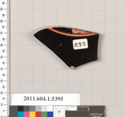 Terracotta fragment of a kylix (drinking cup)