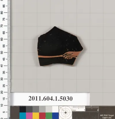 Terracotta fragment of a kylix (drinking cup)