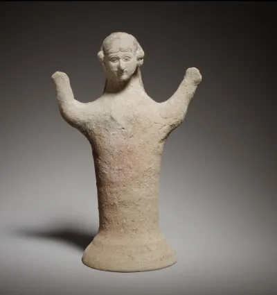 Terracotta statuette of a woman with raised arms