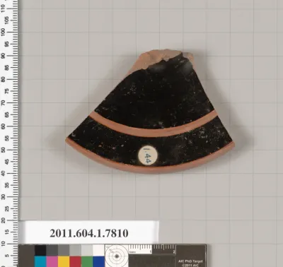 Terracotta fragment of a kylix (drinking cup)