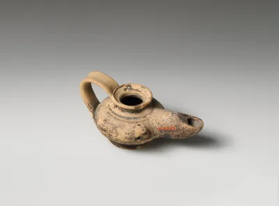 Terracotta oil lamp