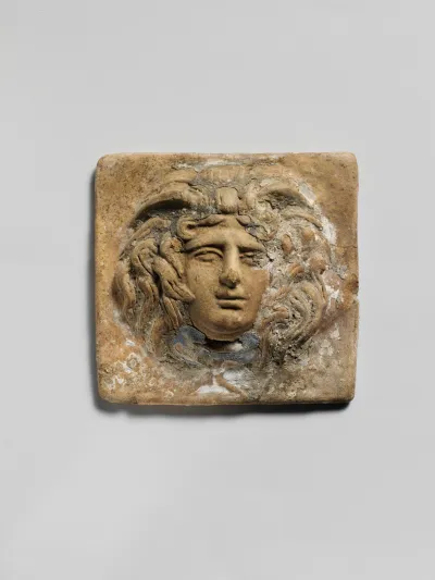 Terracotta relief plaque with head of Medusa
