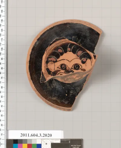 Terracotta fragment of a kylix (drinking cup)