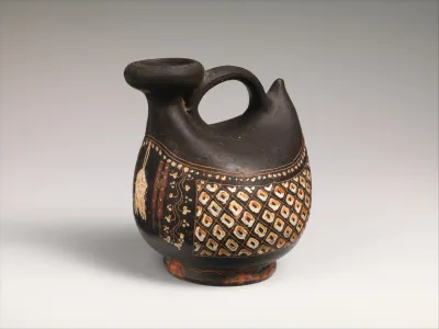 Terracotta askos (flask with spout and handle over top)