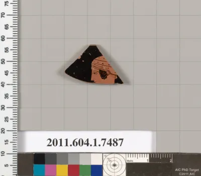 Terracotta rim fragment of a kylix (drinking cup)