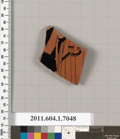 Terracotta fragment of a kylix (drinking cup)