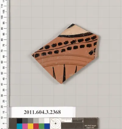 Terracotta fragment of a kylix: eye-cup (drinking cup)