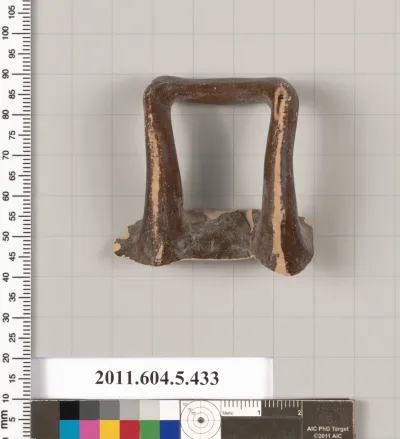 Terracotta fragment of a kylix (drinking cup)