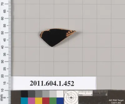 Terracotta fragment of a kylix (drinking cup)