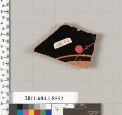 Terracotta fragment of a stemless kylix (drinking cup)