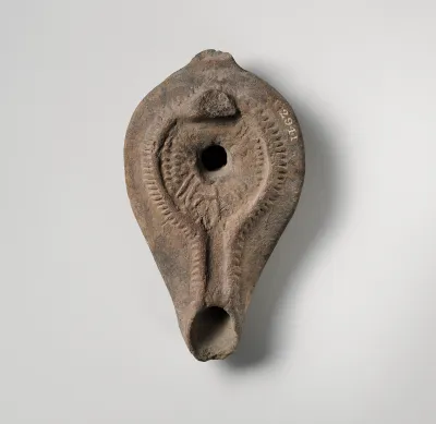 Terracotta oil lamp