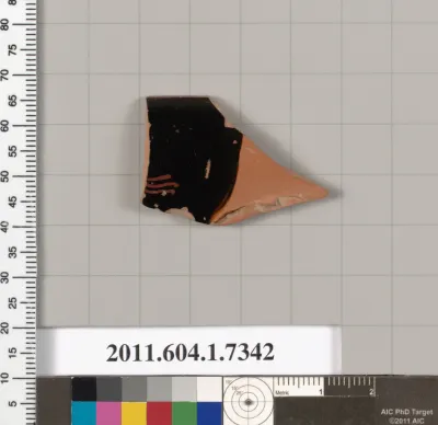 Terracotta rim fragment of a kylix (drinking cup)